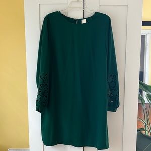 Green midi shift dress with cutout lace sleeves. Size 12.